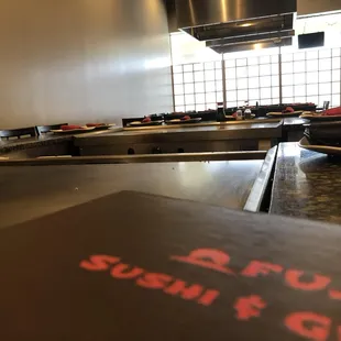 a plate of sushi on the counter