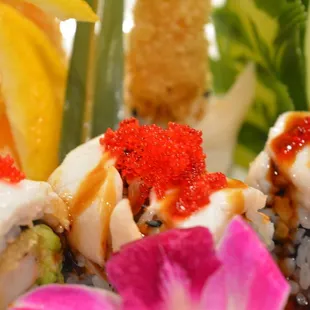 a close up of a plate of sushi