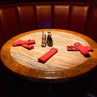 a table with red napkins on it