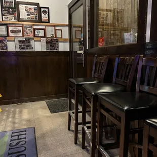 a row of chairs in a restaurant