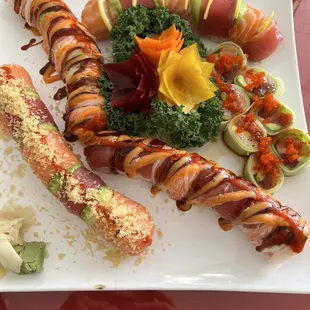 Amazing Hot Mommy Roll, Tiger Roll**, Becker Roll*, sashimi roll, Rainbow Roll*