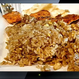 salmon and rice on a plate