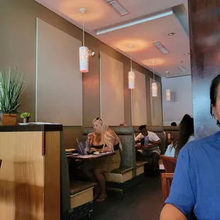 a man sitting in a restaurant