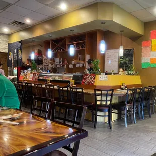 a man sitting at a table in a restaurant