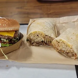 Teriyaki burger with guacamole and cheese and charisu burrito with fried rice and cheese