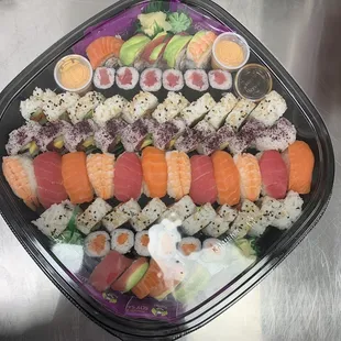 a close up of a plate of sushi
