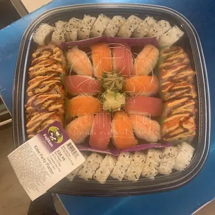 Party tray only $ 28.99 has row fish and cooked sushi