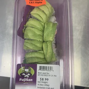 Dragon roll , surimi and cucumber on the top of avocado