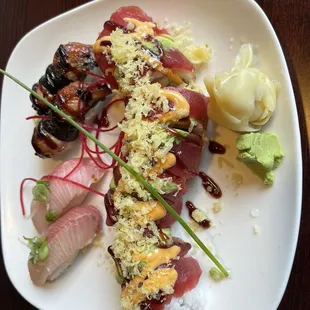 Hamachi (bottom left), Unagi (top left), J Maki roll in the middle.