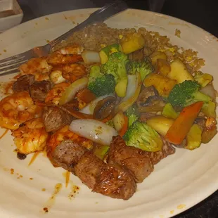 My nephew dinner: shrimp and steak combo.
