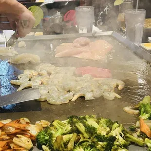 Hibachi veggies along with shrimp, steak, lobster and chicken