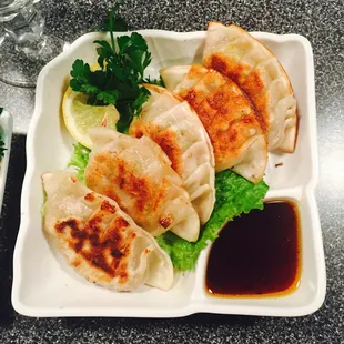 a plate of dumplings