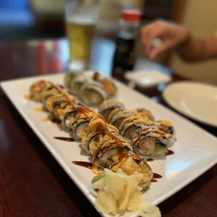 a close up of a plate of sushi