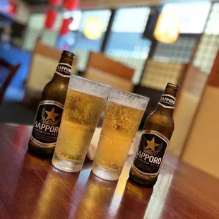 three beers on a table