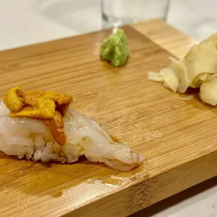 a piece of fish on a cutting board