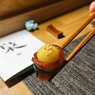 Quail egg wrapped in ..?
