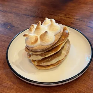 Rogel, a classic Argentinian dessert made with Dulce de Leche sandwiched between crackers topped with meringue