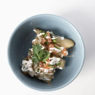 Yuquitas Fried

fried yuquitas with pico de gallo, cream and cilantro sauce