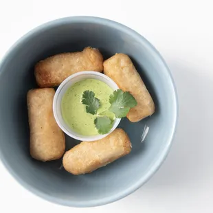 Tequenos

Fried Cheese sticks and coriander sauce