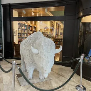 Buffalo statue in front of the bookstore on the mall entrance side.