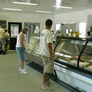 a man and a woman in a store