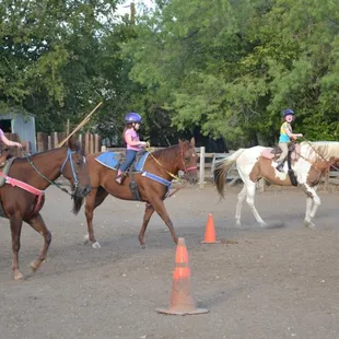 Horseback riding lesson at FCRA where the kids learn skills while playing games with their four-legged friends!