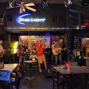 Wick's Pizza sing Karaoke with a live band. Awesome concept.