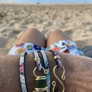 Wrapped sea glass jewelry and leather straps.