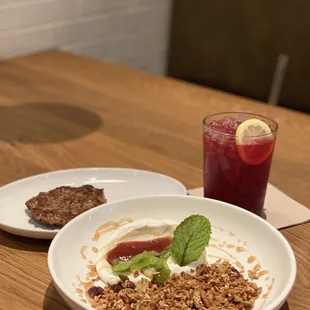 Granola bowl, sausage patty, hibiscus aqua Fresca