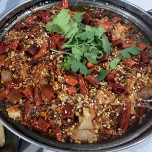 Boiled beef offal. Basically, spicy tripe and beef with bean sprouts. Very good.