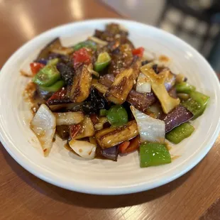 a plate of stir fried vegetables