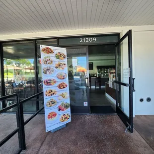 the entrance to a restaurant