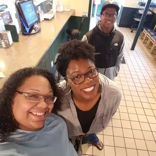 a group of people in a restaurant