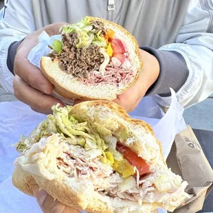 a man holding a sandwich