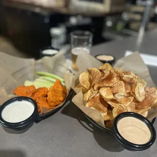 Homemade Chips, boneless chicken wings and homemade dipping sauces