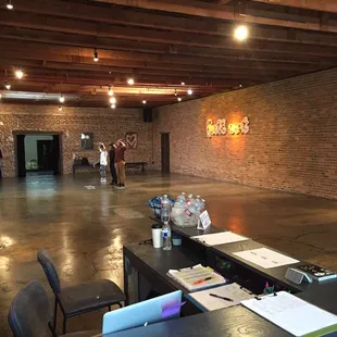 View of the first studio with the reception in the foreground.