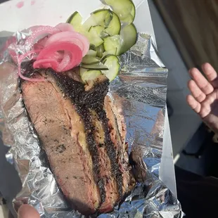 Brisket with picked red onions and homemade pickles