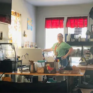 a woman making a drink