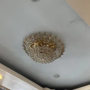a chandelier in the ceiling