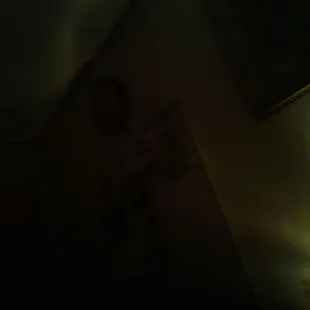 a man in a dark room