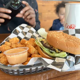 a man taking a picture of his meal