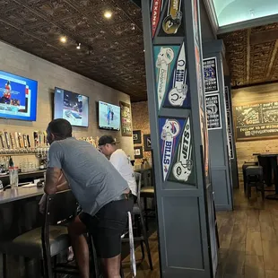 people sitting at the bar