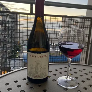 Enjoying a Three Otters Pinot Noir from Fullerton while visiting Seaside, OR