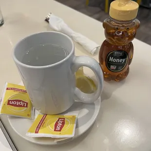 Cup of hot tea with lemon and honey