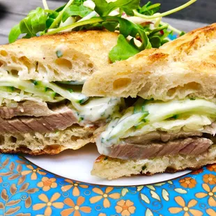 Slow-Roasted Beef Brisket with gruyère cheese and garlic-chive aioli.