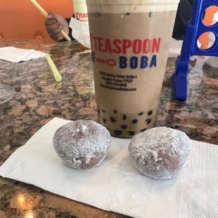 two donuts and a drink