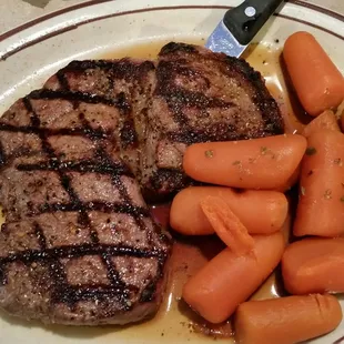 Steak dinner with delicious carrots