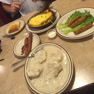 I ordered biscuits and gravy with side of bacon. He ordered Fulton skillet with white toast. Fried pickles as appetizer.