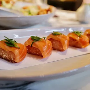 Sea trout sushi over crispy rice
