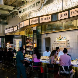 customers sitting at the counter